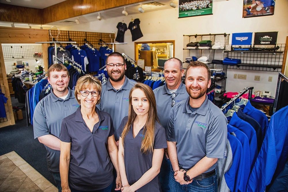 The Grocott Ink & Thread team inside their Hartford, SD shop