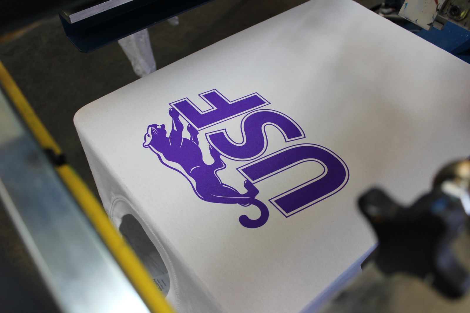 USF screen on press — University screen print
