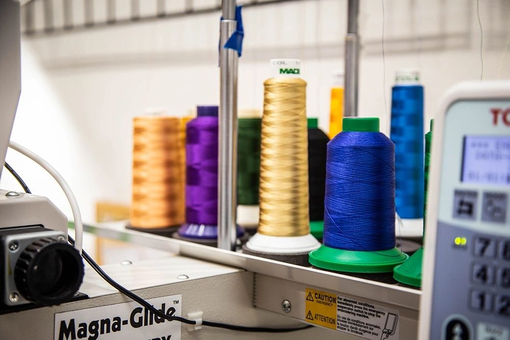 Inside the Grocott Ink & Thread custom screen printing and embroidery shop in Hartford, SD